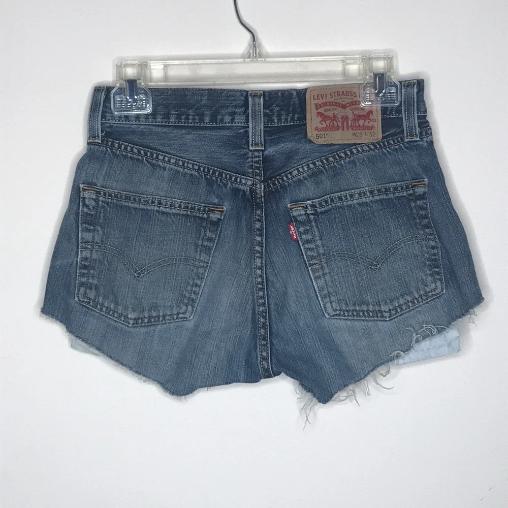 Levi 501  distressed shorts 28 Waist